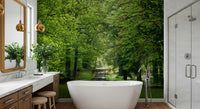 Vibrant green woods, sunlit lane, Flourishing Path peel and stick wallpaper.