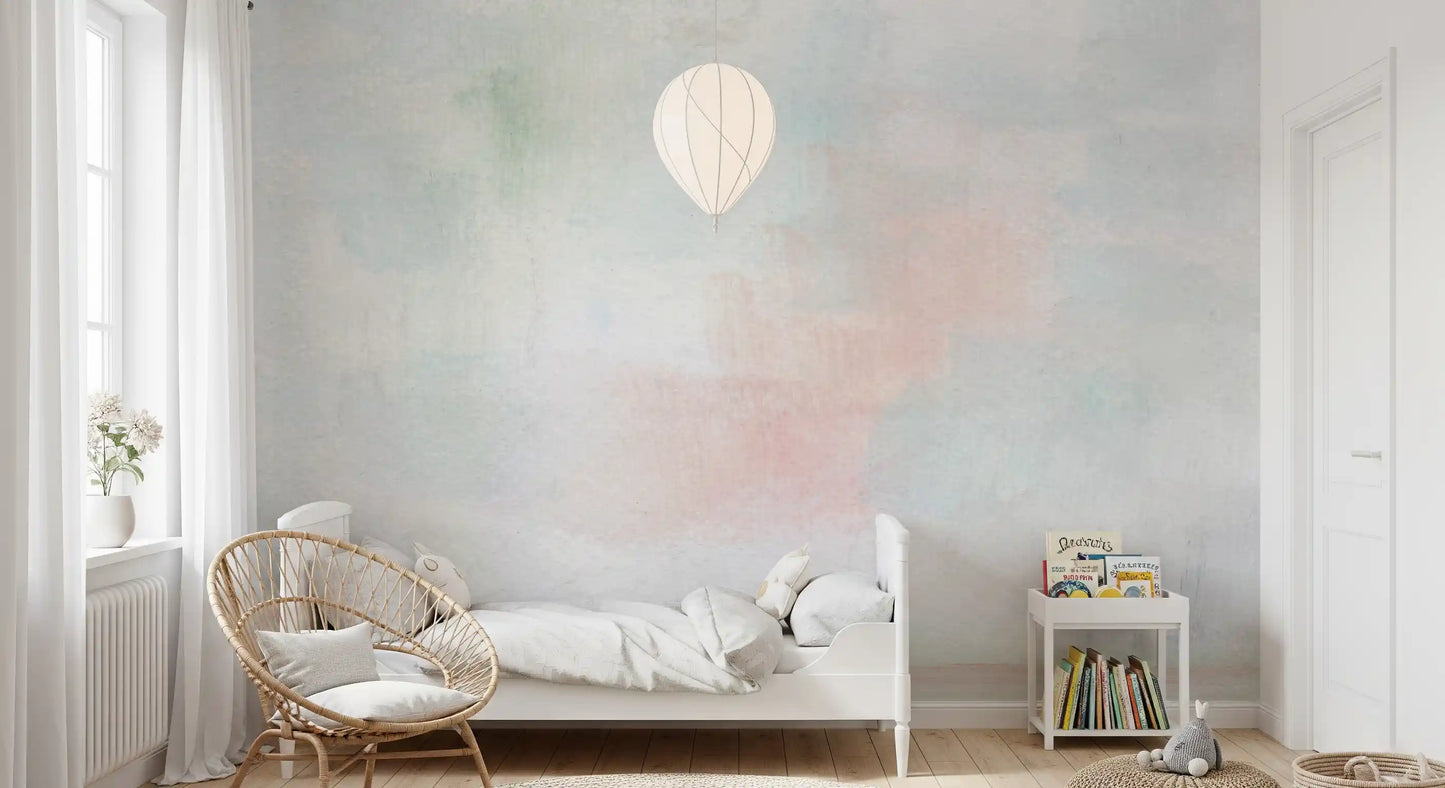 Abstract sky-inspired mural with faded blue, white, and pink tones