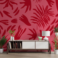 Crimson dance wall mural brightening a hallway with tropical leaf movement
