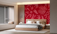 Botanical pattern wall mural with crimson base and pink shapes