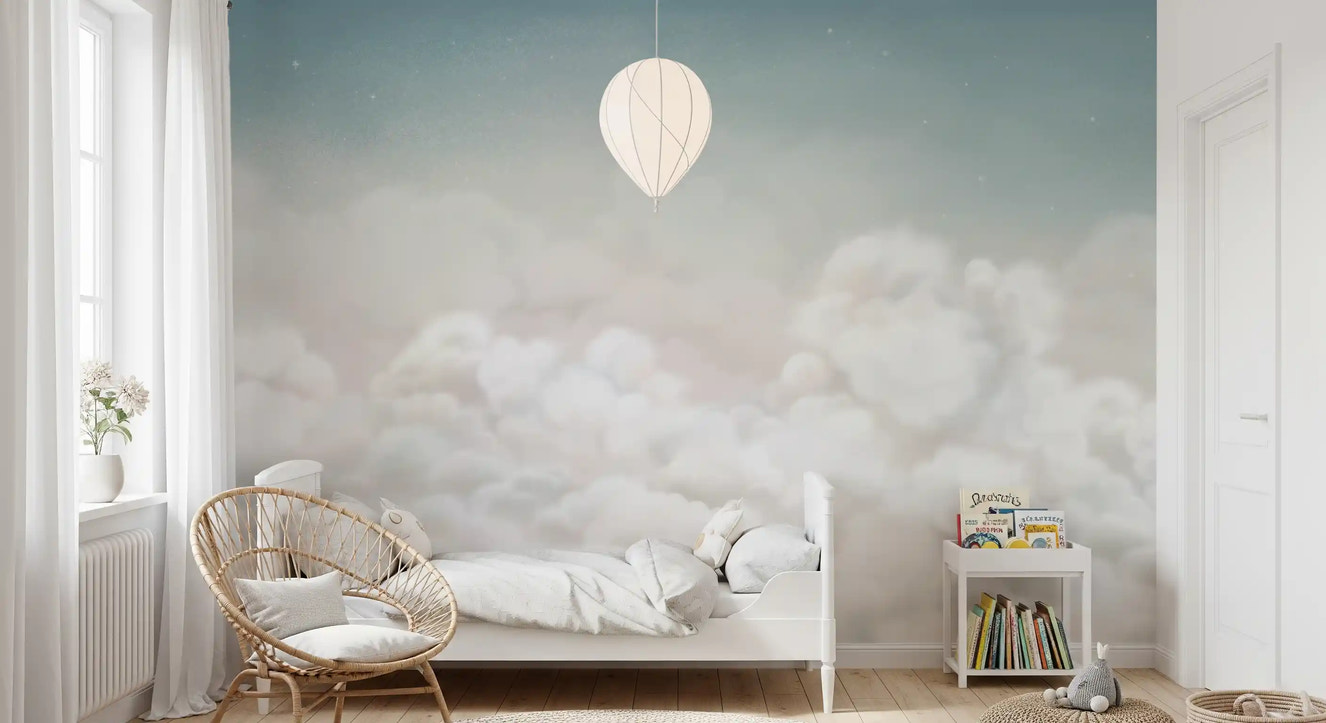 Soft blue sky wall mural with layered clouds in a girls room setting
