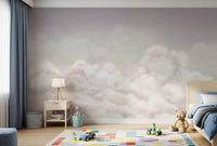 Soft cloud wall mural for a children room with pastel pink and grey tones