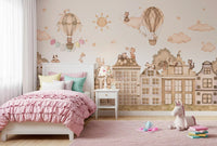 Neutral skyline wall mural with playful cats and minimal building design