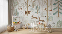 Playful woodland wall mural with soft blue foliage and hand-painted animal details