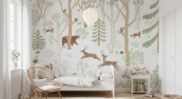 Woodland animal wall mural for a children room with soft green tree illustrations