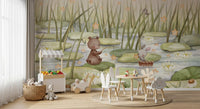 Nursery setup with pond animal wall mural and watercolor lily pads