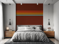Bedroom wall featuring Retro Stripe Horizon wall mural warm color bands