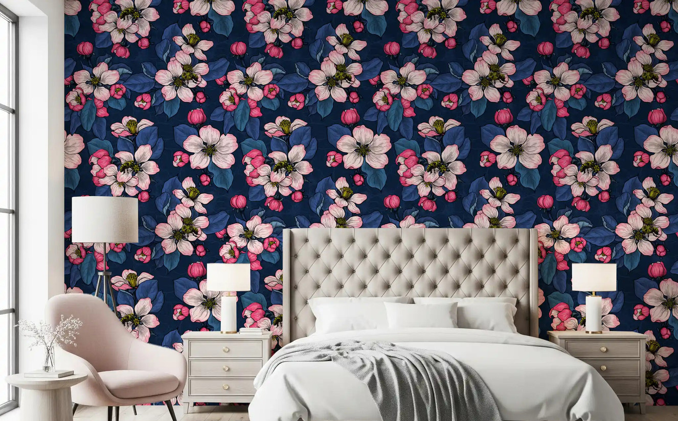 Bedroom wall featuring Apple Blossom on Dark Blue wallpaper pink blooms