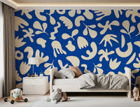 Bedroom wall styled in Organic Flow Mural with bold blue modern pattern