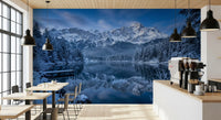 Dining room with Alpine Winter Reflection Wall Mural snowy peaks.