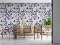 Delicate hummingbirds animate Twilight Bloom wallpaper with grey leafy branches