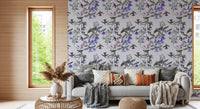 Violet bell flowers drift across Aviary Twilight wallpaper with soft bird forms