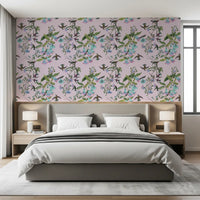 Graceful hummingbirds drift through Aviary Flowers wallpaper with pastel petals