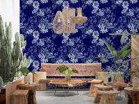 Cafe area Midnight Flower wallpaper showing blue blooms and leafy stems