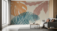 Living room shows a gentle palm and monstera mix in this Botanical Flow wall mural.