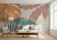 Subtle Botanical Flow wall mural pairs a navy palm with a terracotta monstera leaf.