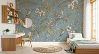 Blue tropical wall mural with detailed birds and floral branches