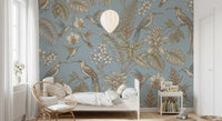 Soft floral branches shape this Tropical Flight wall mural design