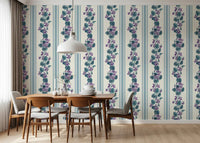 Blue violet wallpaper featuring trailing flowers and clean vertical rhythm