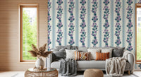 Living room styled with Violet Stripe Wallpaper and leafy floral movement