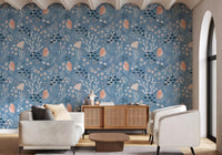 Hallway using blue seashell wallpaper with coral branches and fish artwork
