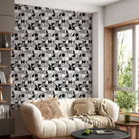 Hallway feature wall styled in Monochrome Cat Maze wallpaper artwork
