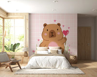 Cute brown capybara holding a heart on Capybara in Love wall mural