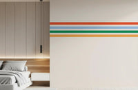 Bedroom wall finished in Retro Vibe Horizontal Stripes wall mural with bold bands