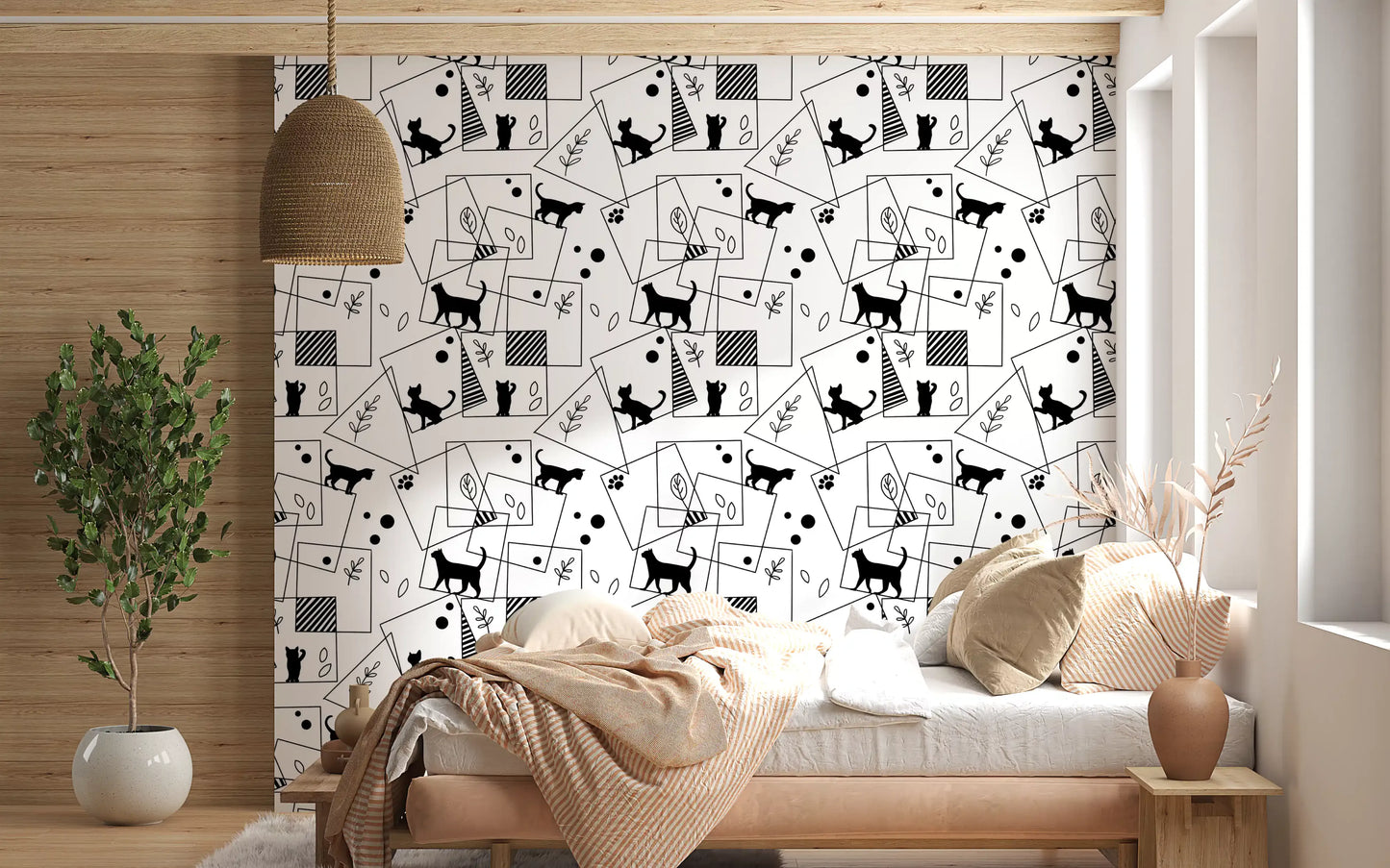 Bedroom lined with Geometric Cats wallpaper of cat shapes and squares

