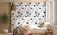 Bedroom lined with Geometric Cats wallpaper of cat shapes and squares
