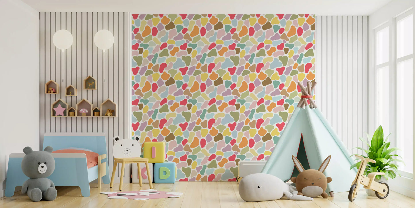 Kids backdrop styled in Playful Pebble wallpaper print
