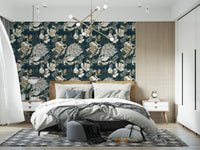 Bedroom wall showing teal botanical wallpaper with abstract flowers