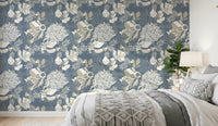 Cool tones bring the bedroom together with Dusty Blue Floral wallpaper.