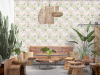 Café setting area in pink and green bloom pattern wallpaper