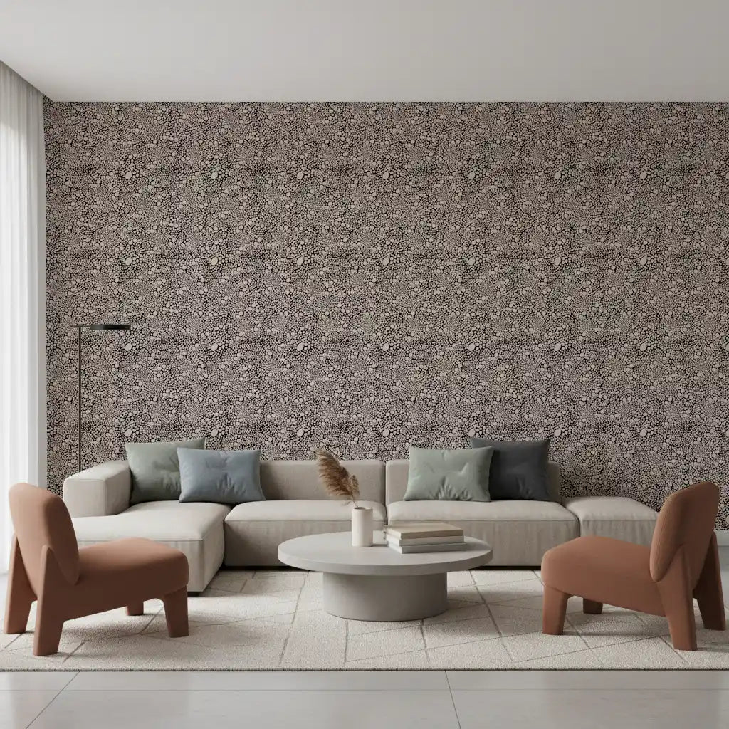 Tonal contrast runs through the organic pebble mosaic wallpaper on dark espresso ground