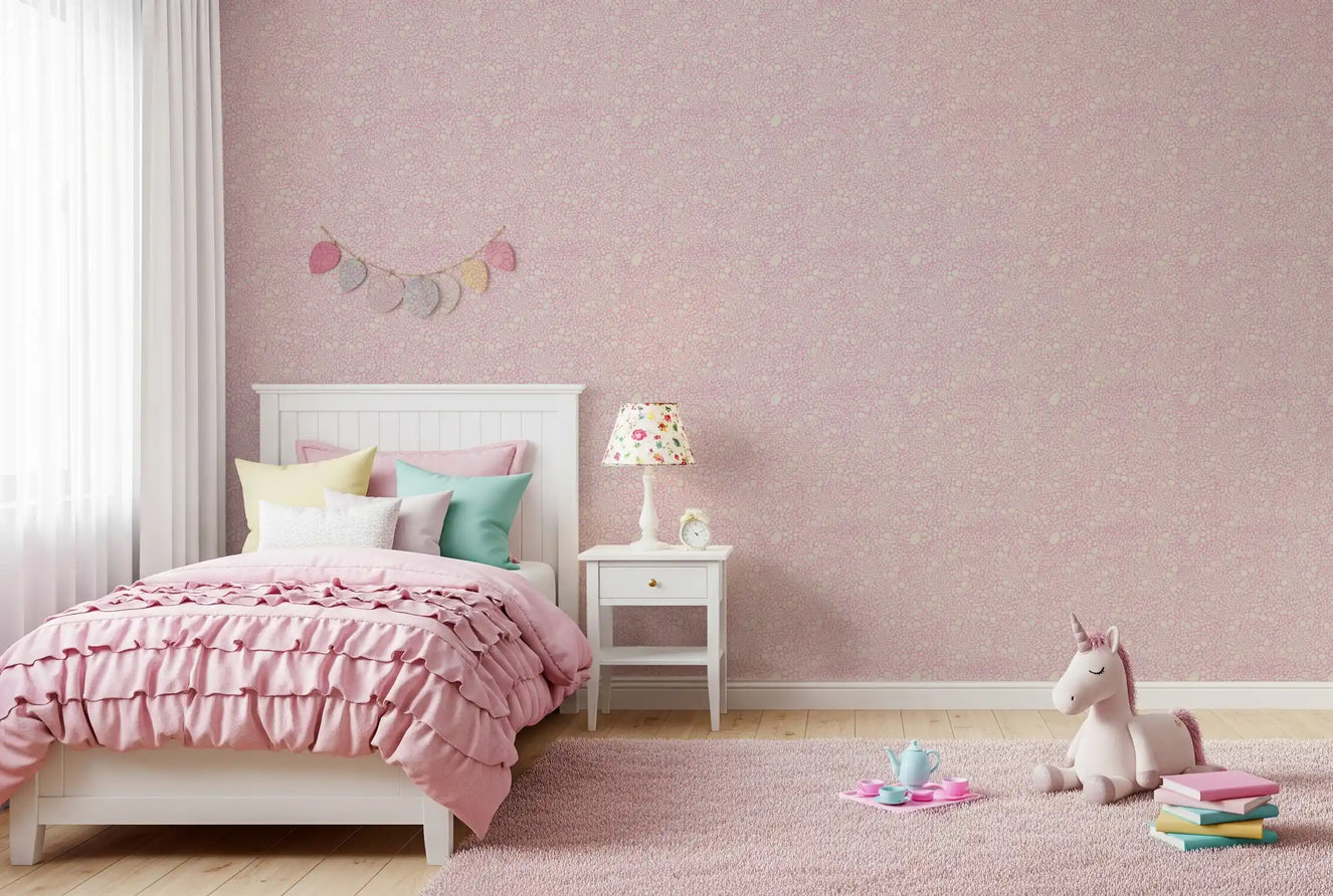 Pebble Bloom wallpaper wraps a kids' room in pastel pink and cream dots
