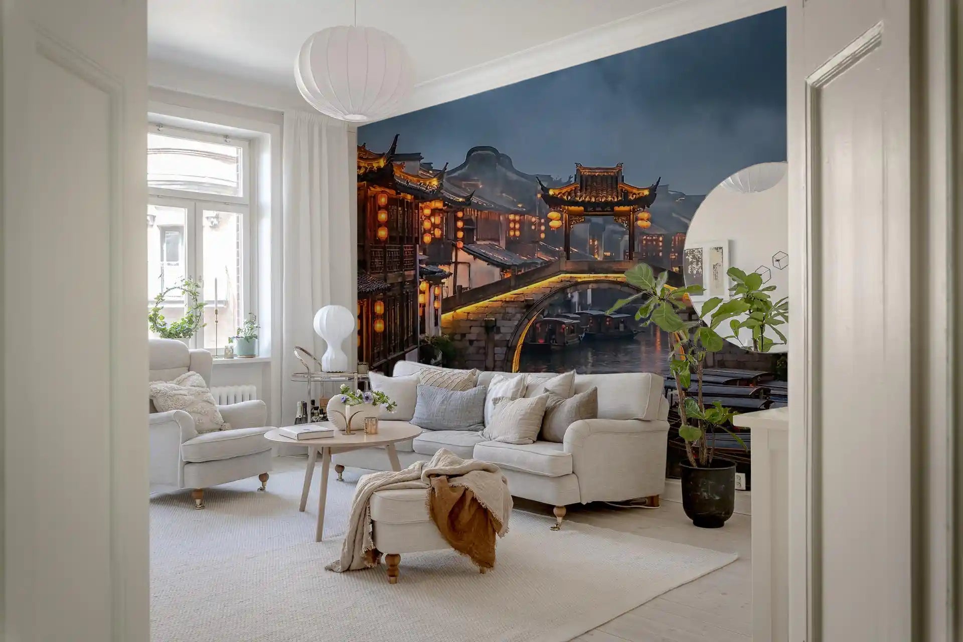 Bright lounge featuring scenic canal wall mural as full backdrop