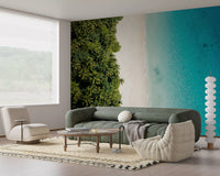 Coastal wall mural showing a dense palm forest meeting clear turquoise water