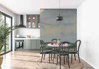 Dining room featuring hillside horizon wall mural with green and gray tones
