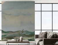 Modern lounge showing painterly hillside wall mural with misty sky tones
