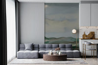 Painterly horizon wall mural showing rolling slopes in green and brown