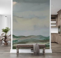 Hallway entryway brightened by serene horizon watercolor wall mural
