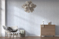 Brushstrokes form a quiet repeat on this watercolor wallpaper.