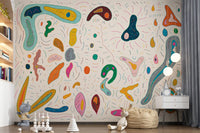 Teal boomerang and yellow oval forms on the abstract shapes wall mural