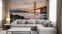 Sunset bridge wall mural installed in the entryway, welcoming visitors with warm skies