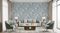 Dusty blue fan shell motifs scattered across the boho seashell wallpaper