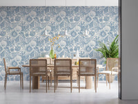 Muted blue seashell wallpaper running the length of a contemporary Dining room