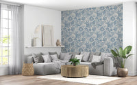 Sea urchin and coral branch detail in the muted blue coastal wallpaper