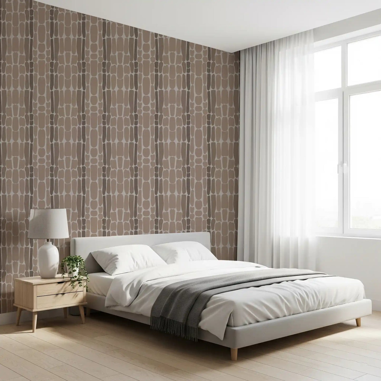Walnut, taupe, and beige pebbles arranged in soft vertical runs on wallpaper