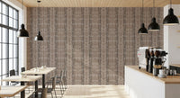 Open Café and restaurant backed by hand-painted stone mosaic wallpaper
